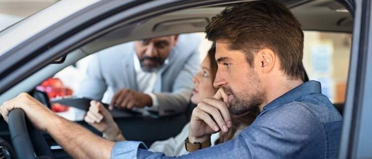 A couple buying a new car in a competitive market.