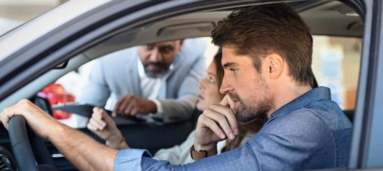 A couple buying a new car in a competitive market.